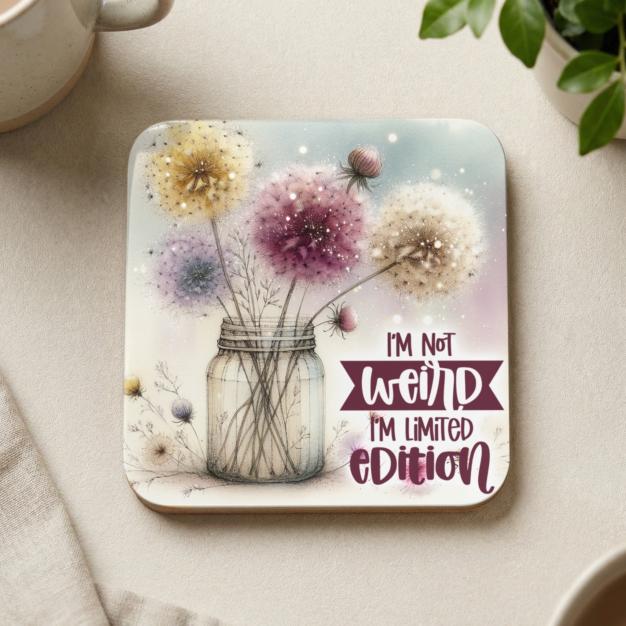 Dandelion bouquet in jar with "I'm not weird I'm limited edition" text.