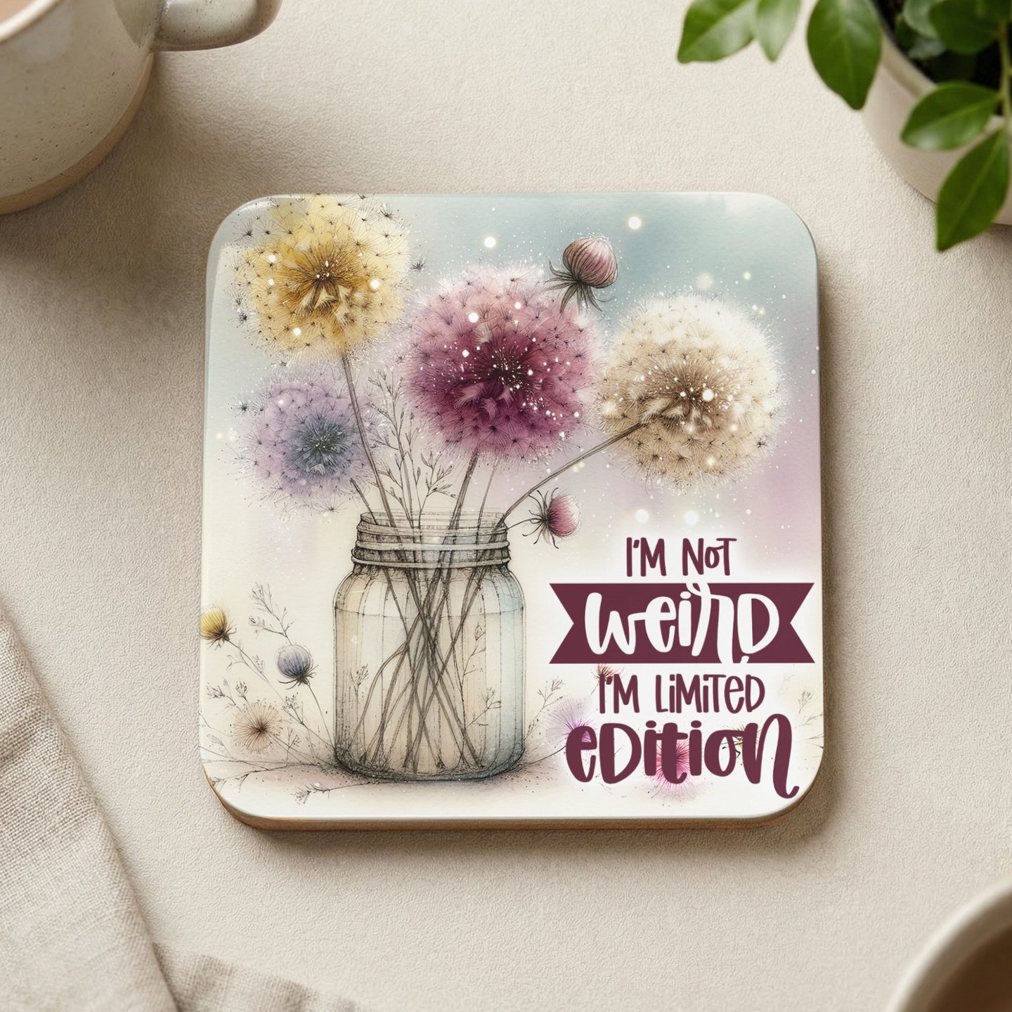 Dandelion bouquet in jar with "I'm not weird I'm limited edition" text.