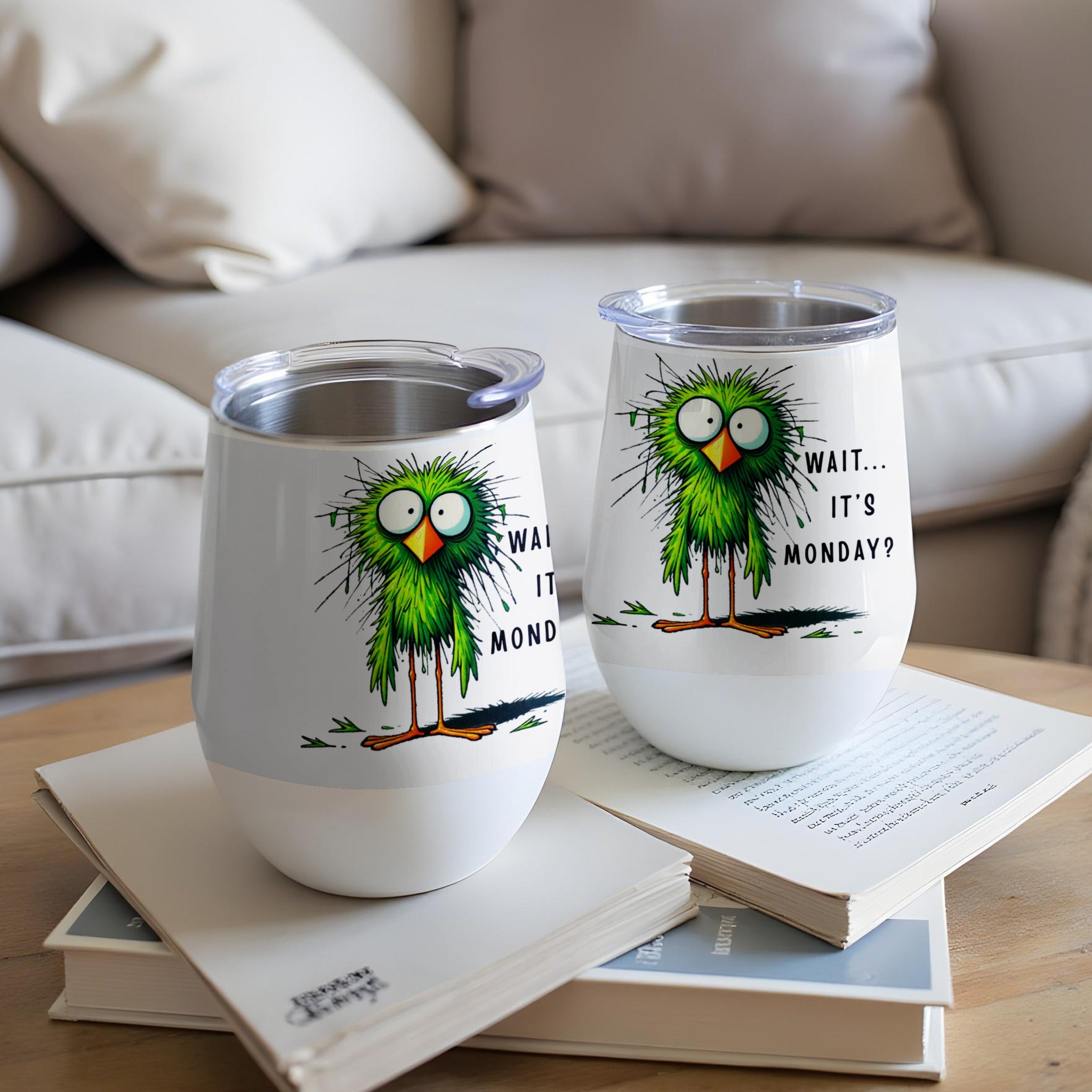 Two white tumblers with cartoon green birds and text "WAIT... IT'S MONDAY?".