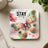 Colorful butterfly coaster with "STAY STRONG" text and floral accents.