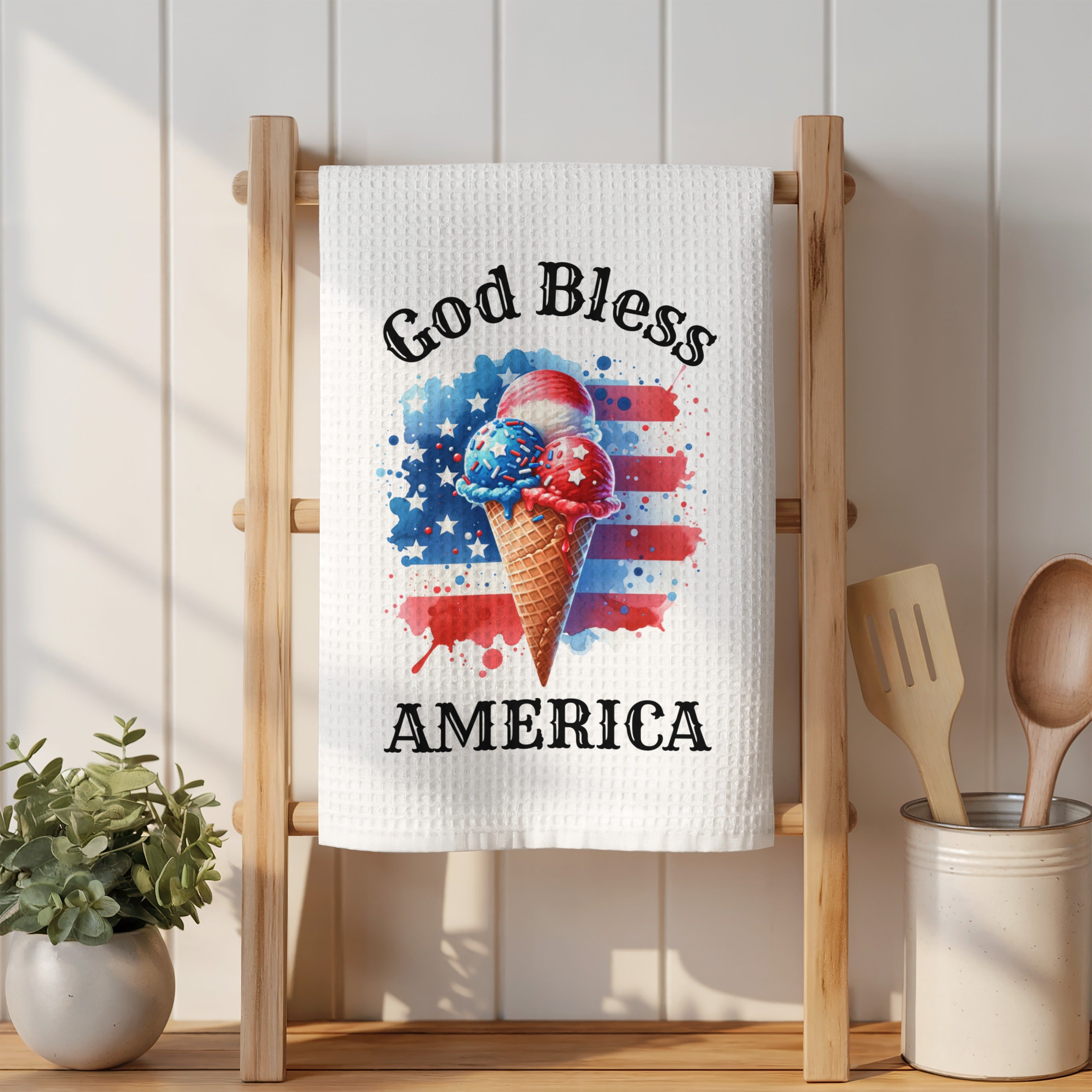 Ice cream cone with American flag design on white towel.