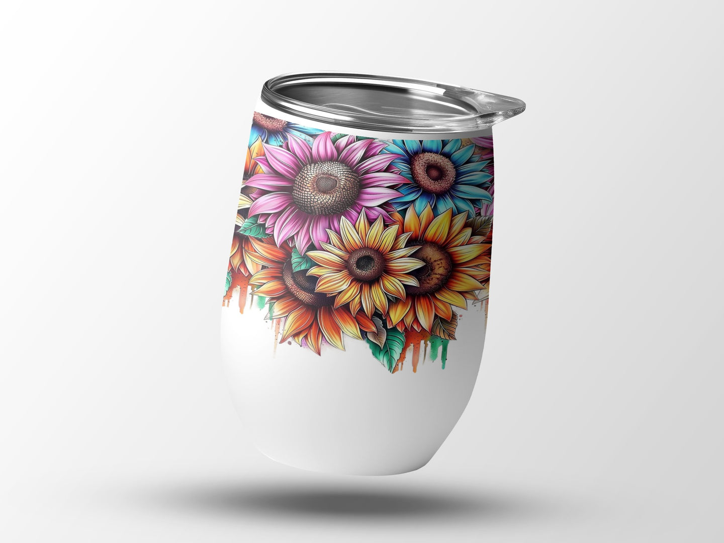 White tumbler with colorful sunflower floral design and silver lid.