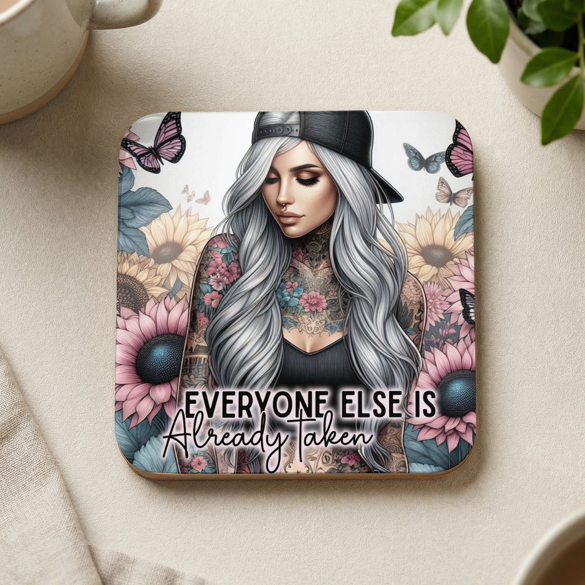 Woman with tattoos and flowers, text reads "Everyone else is already taken."