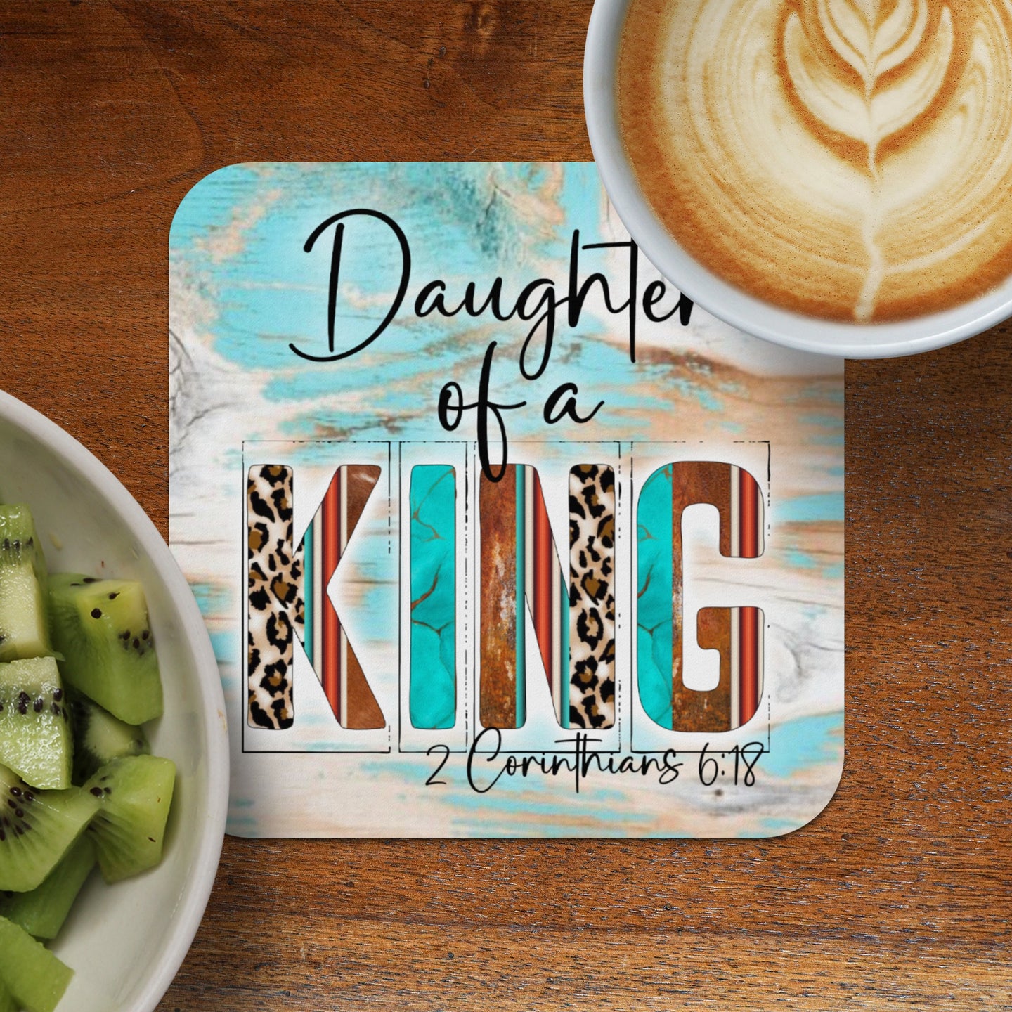 Coaster with "Daughter of a King" and Bible verse in colorful, distressed wood style.