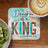 Coaster with "Daughter of a King" and Bible verse in colorful, distressed wood style.
