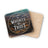 Round coaster with "In Whiskey We Trust" text on wood grain background.
