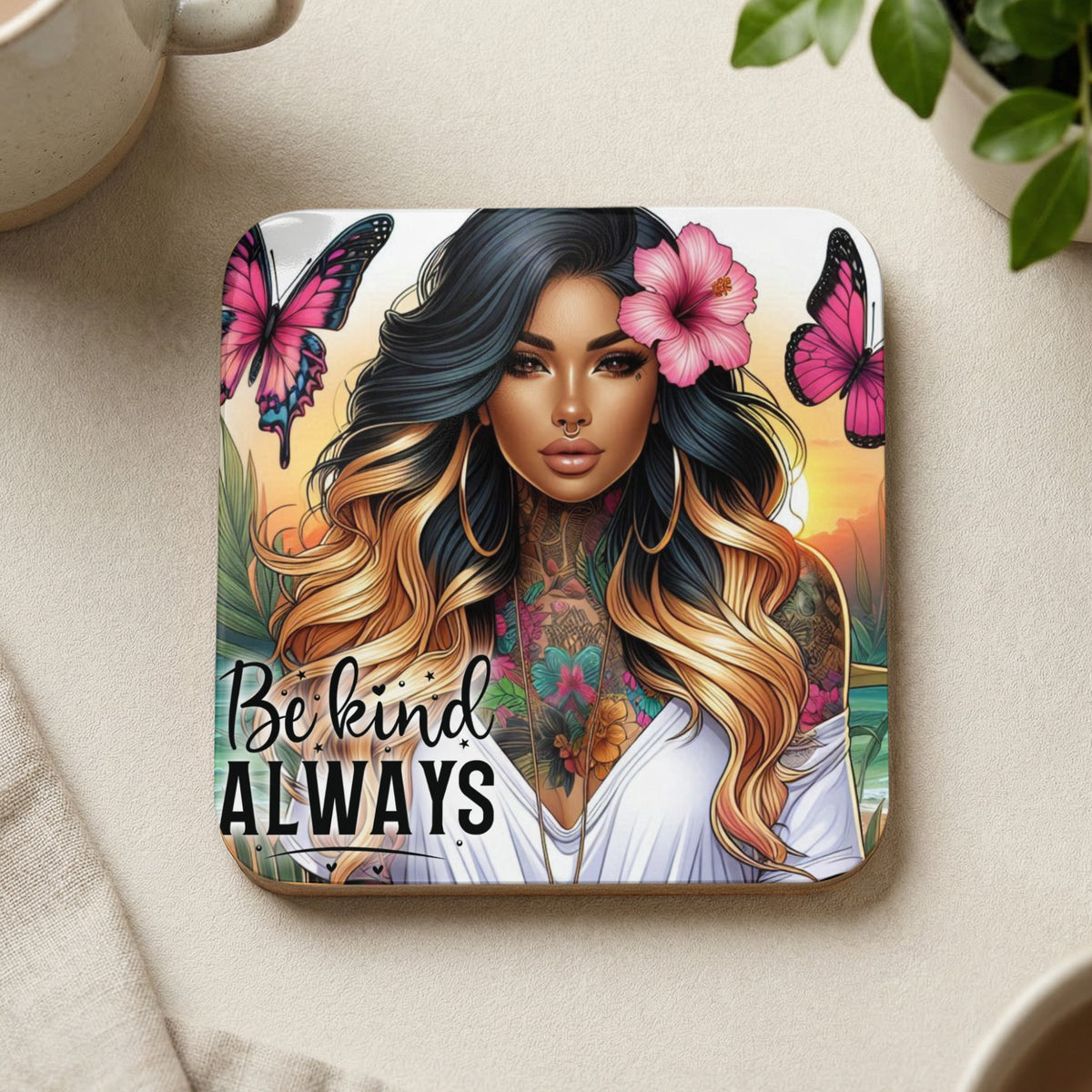 Tattooed woman with pink flower in hair, butterflies, and "Be kind ALWAYS" text.