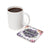 White mug of coffee beside square coaster with lavender floral design and text "I will succeed today."