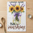 Mason jar with sunflowers and lavender tied with purple bow, text "own sunshine".