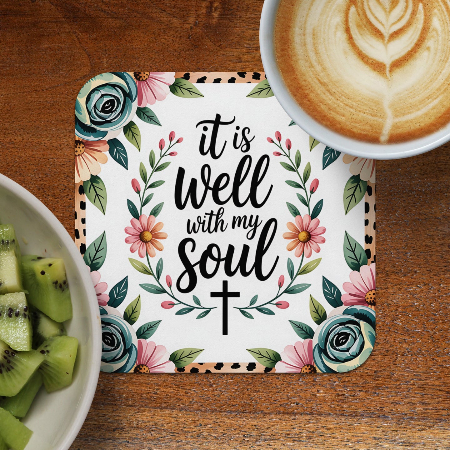 Square coaster with "it is well with my soul" text, flowers, and a cross.