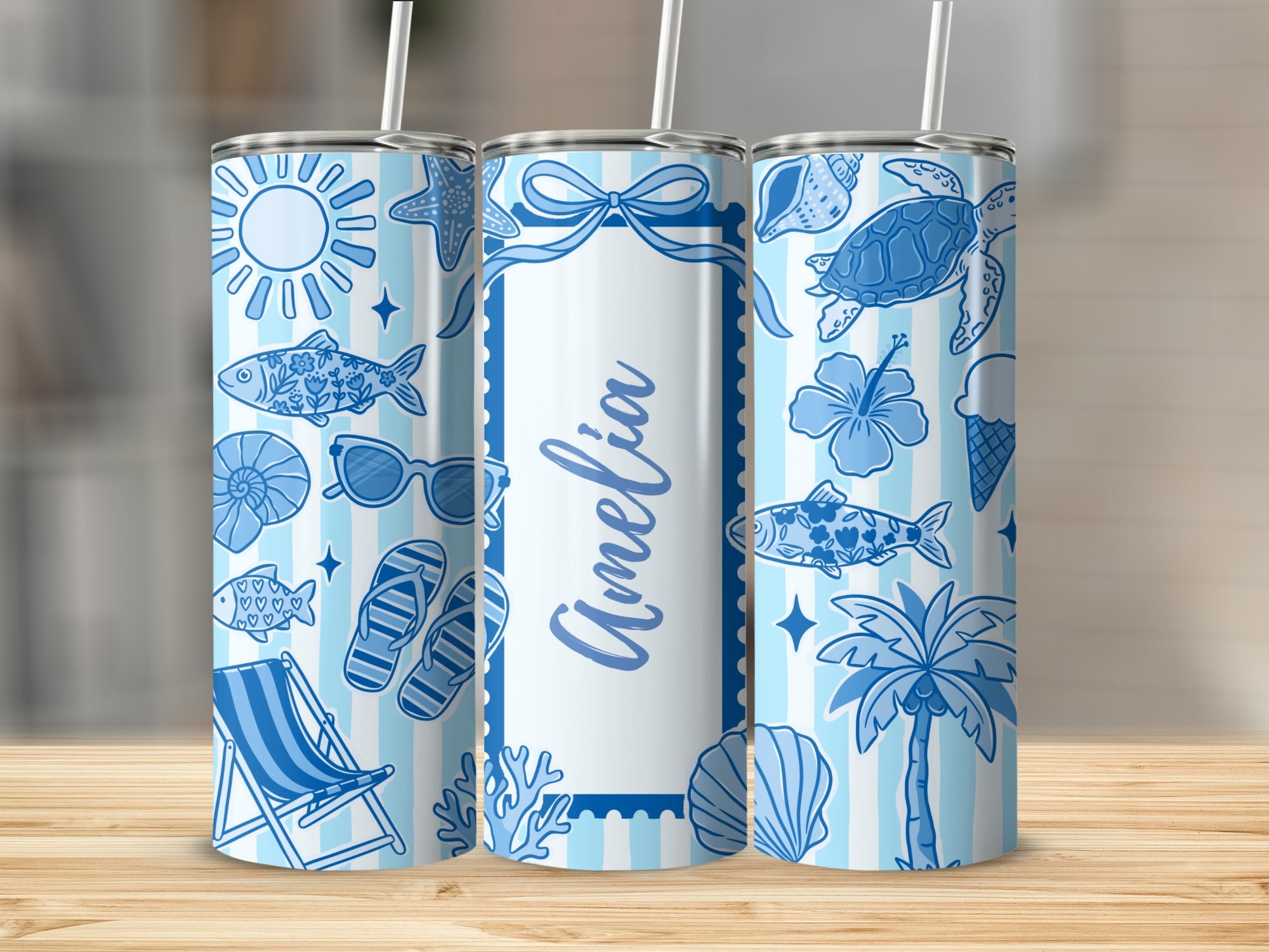 Personalized tumbler with beach theme, seashells, starfish, and personalized name Amelia.