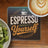 Espresso Yourself coffee coaster with latte art and sliced kiwi.