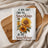 Kitchen towel with sunflowers and "If you can't find the sunshine, be the sunshine" text.