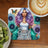 Woman with colorful hair and butterfly art, "Dreams Don't Work Unless You Do".