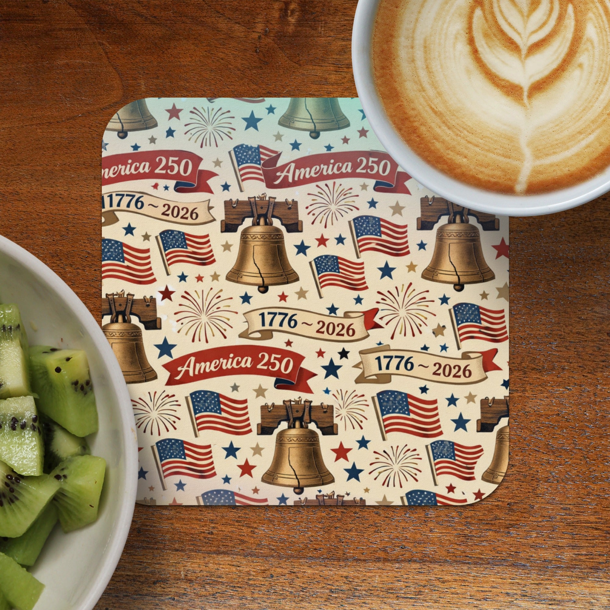 Patriotic pattern coaster with bells, flags, fireworks, and "America 250 1776-2026".
