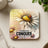 Daisy coaster with ladybug and text "Conquer Conquer".