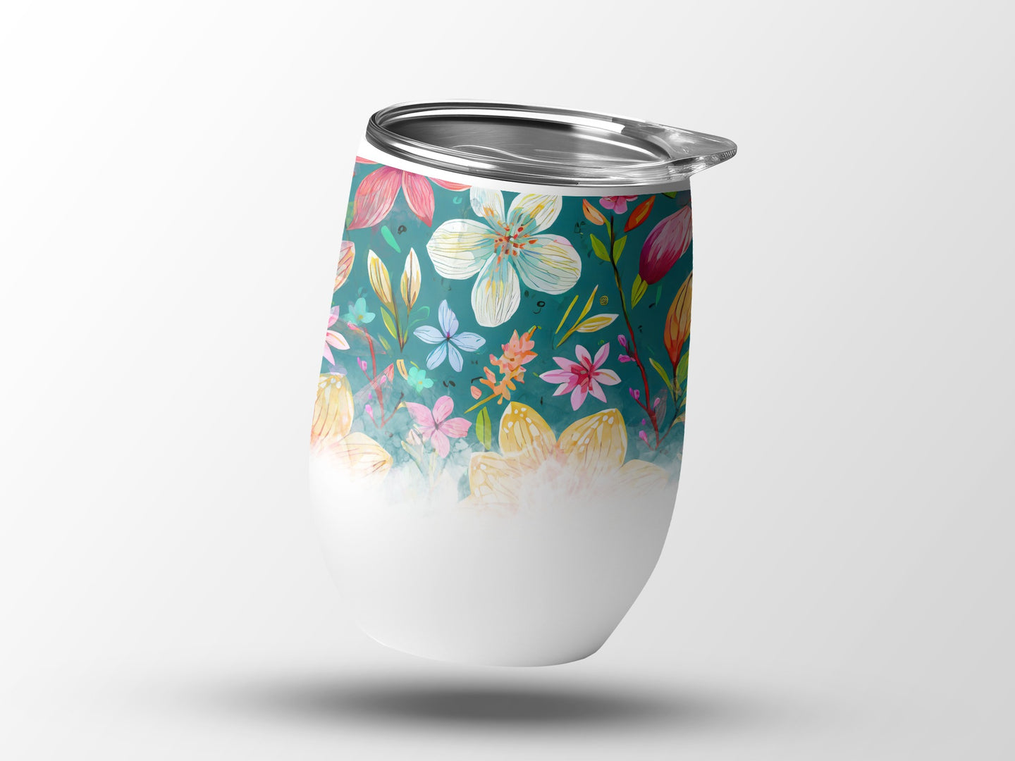 White tumbler with floral watercolor pattern and silver lid.