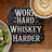 Wooden coaster with "WORK HARD WHISKEY HARDER" text next to kiwi slices and coffee.