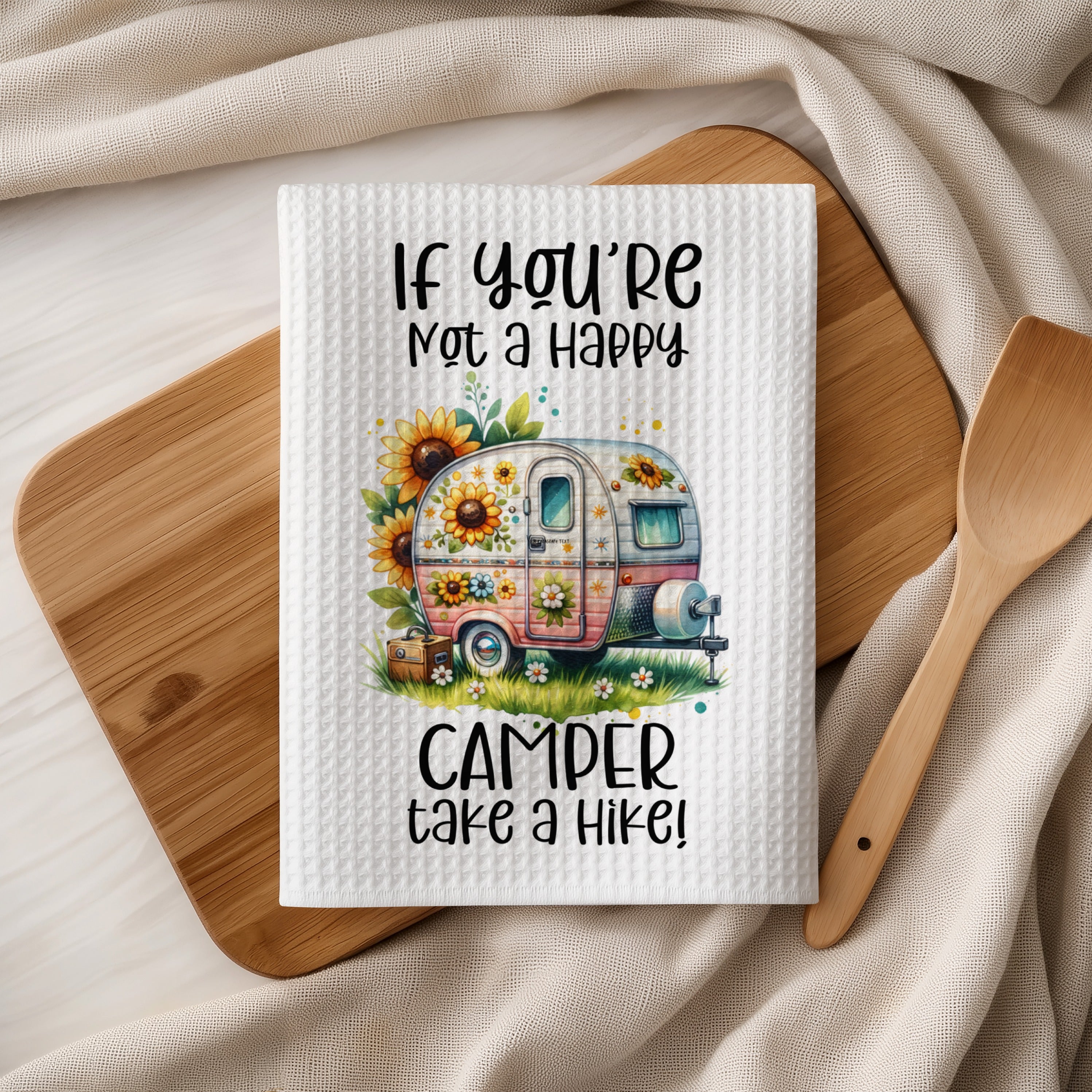Camper and sunflowers with text "If you're not a happy camper take a hike!"