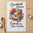 Towel with "Breakfast without Biscuits is just brunch" text and floral biscuit illustration.