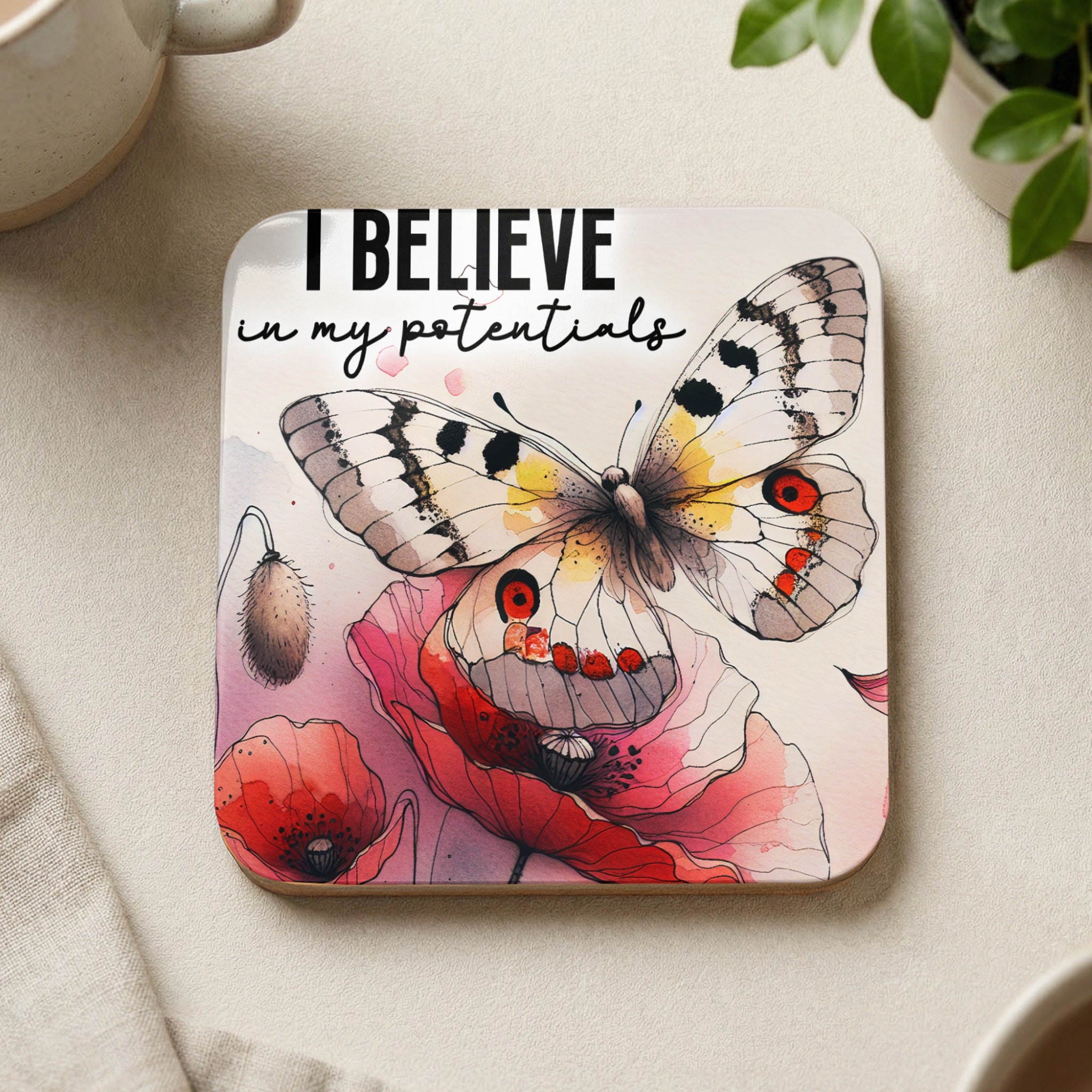Coaster with butterfly and poppies, text "I BELIEVE in my potentials".