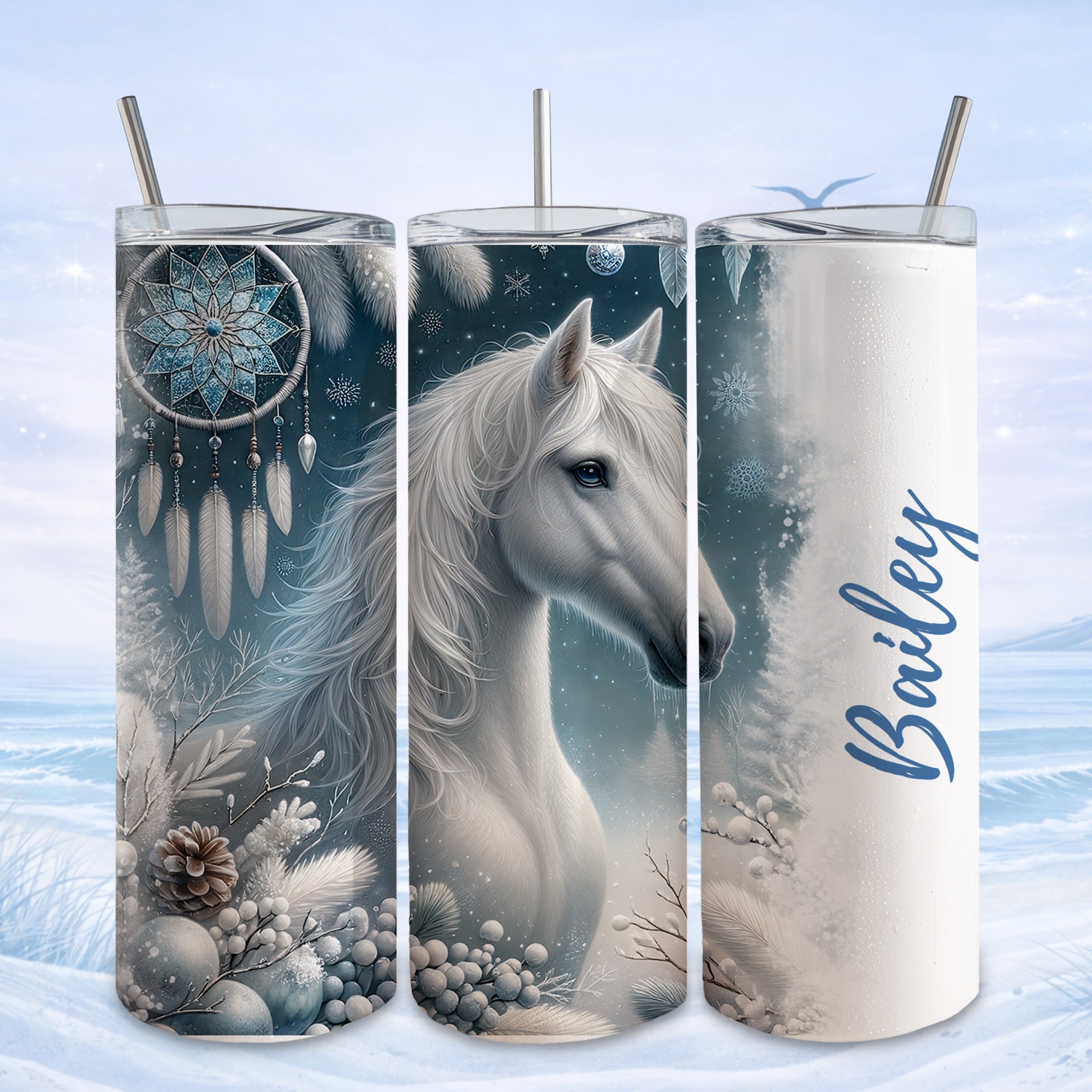 White horse with dreamcatcher and pinecones on a snowy tumbler.