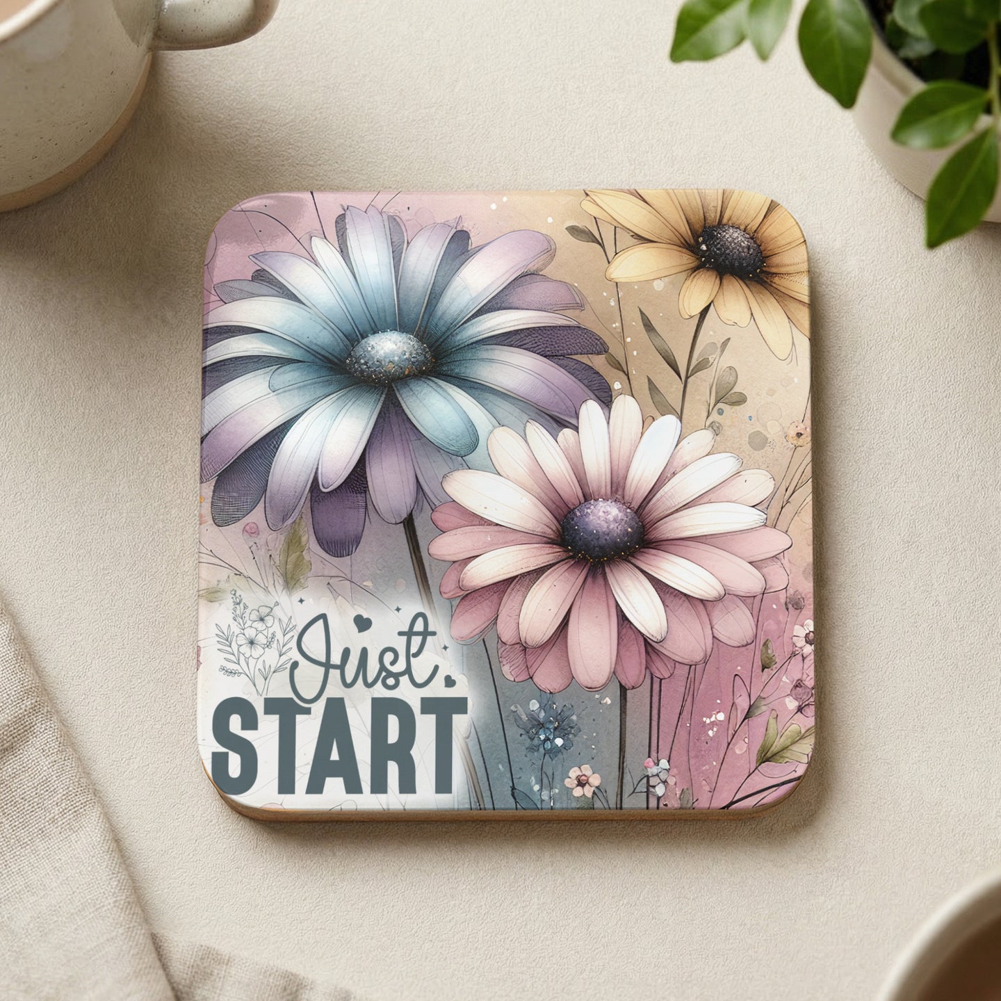 Square coaster with pastel daisies and "Just: Start" text.