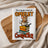 Mouse cooking omelet on stack of cookbooks, text says "The way you make an OMELET reveals your CHARACTER."