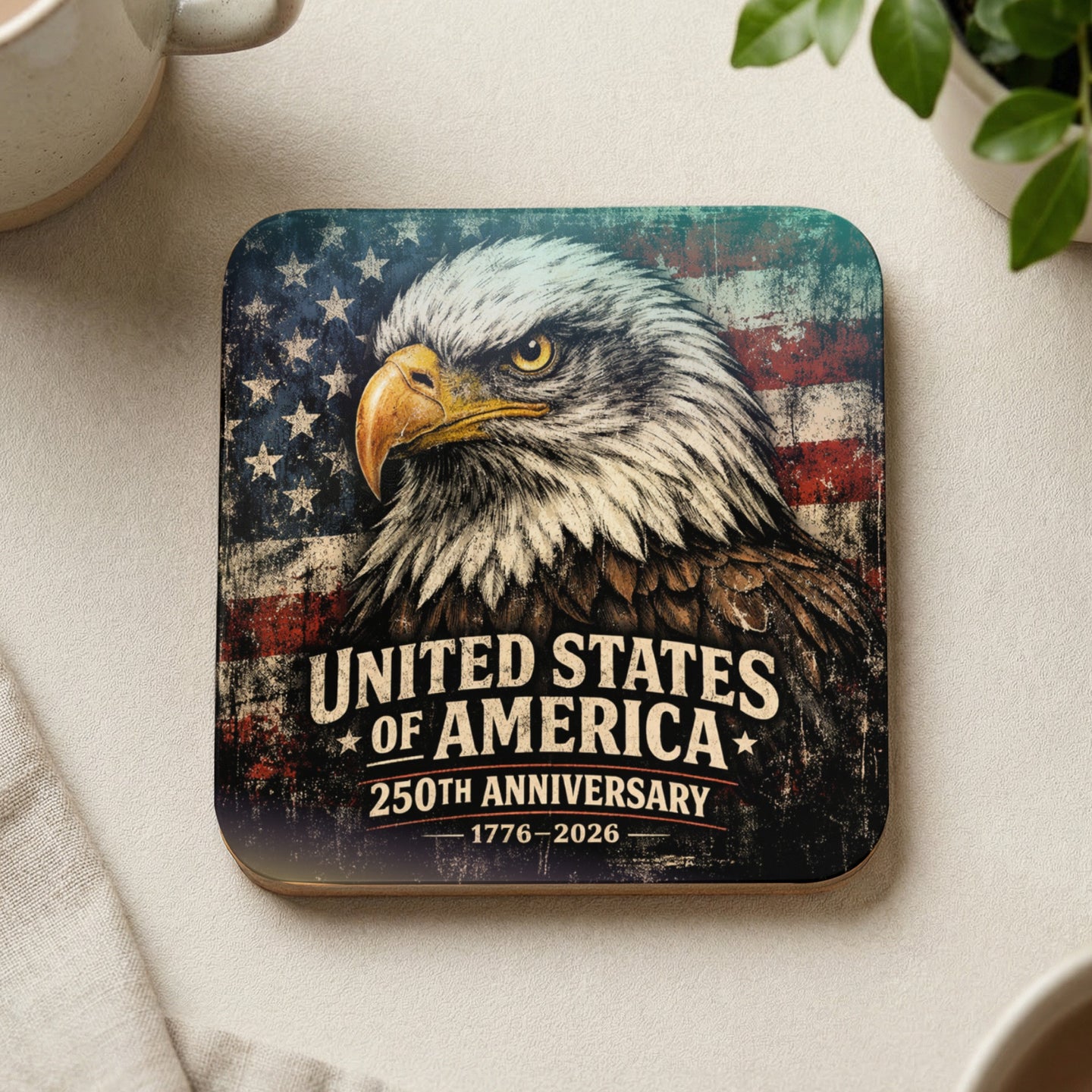 Eagle against United States flag on a coaster, commemorating 250th anniversary 1776-2026.