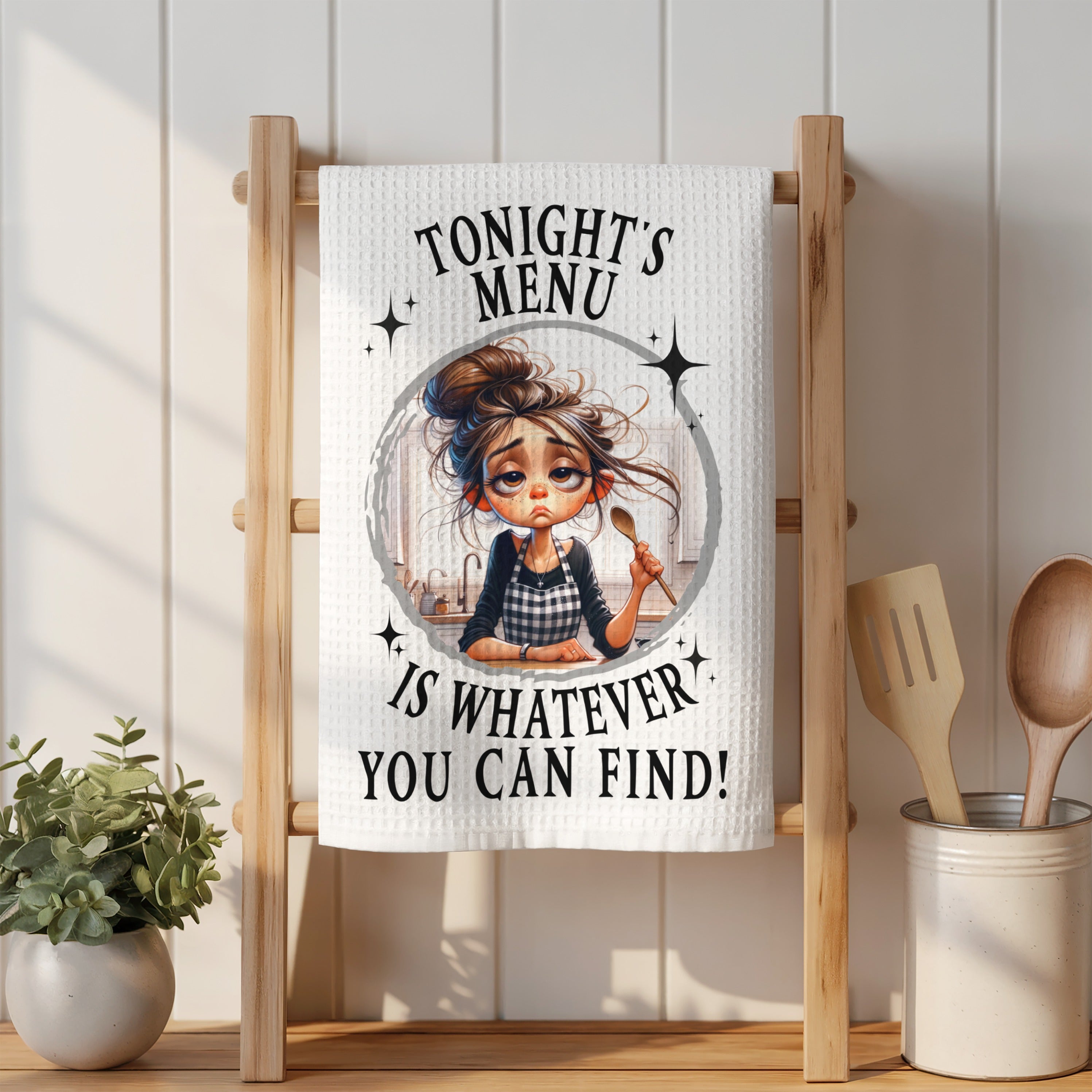 Towel with cartoon woman and text "Tonight's menu is whatever you can find".