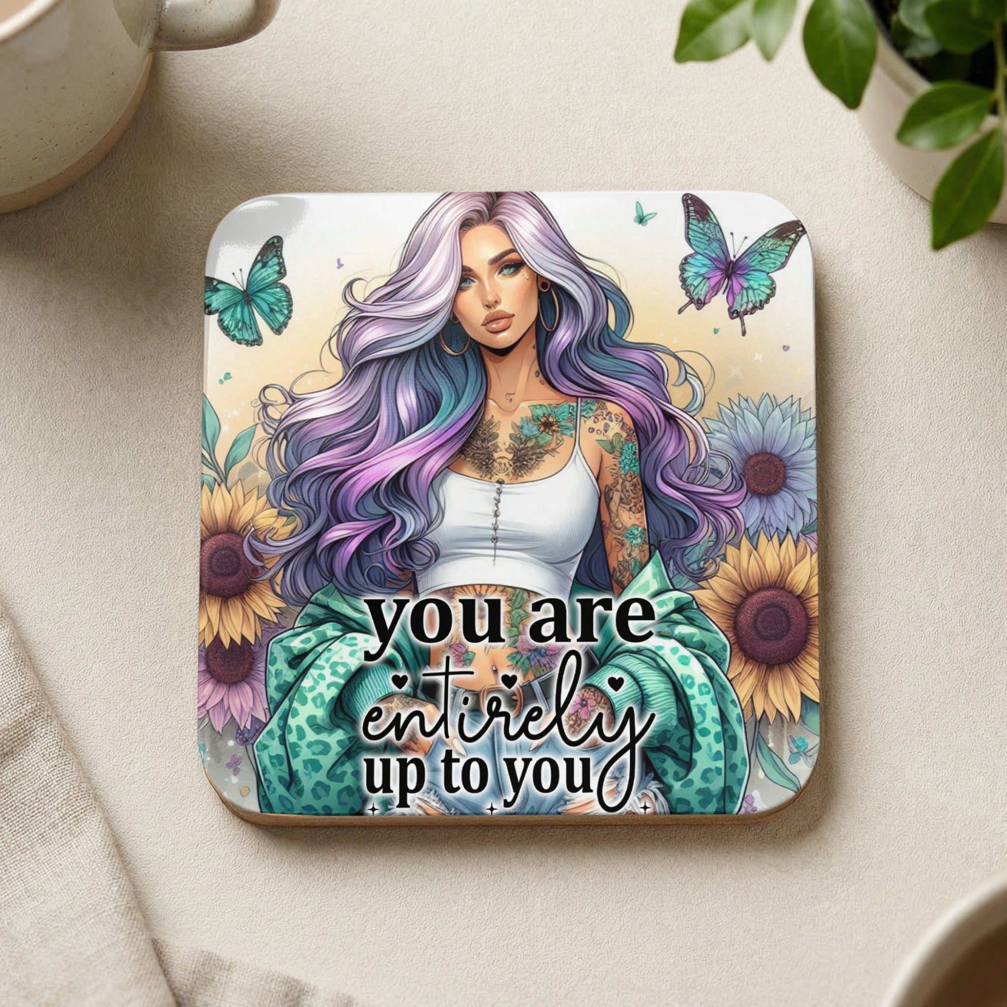 Woman with colorful hair and tattoos, surrounded by sunflowers and butterflies, with text "you are entirely up to you".