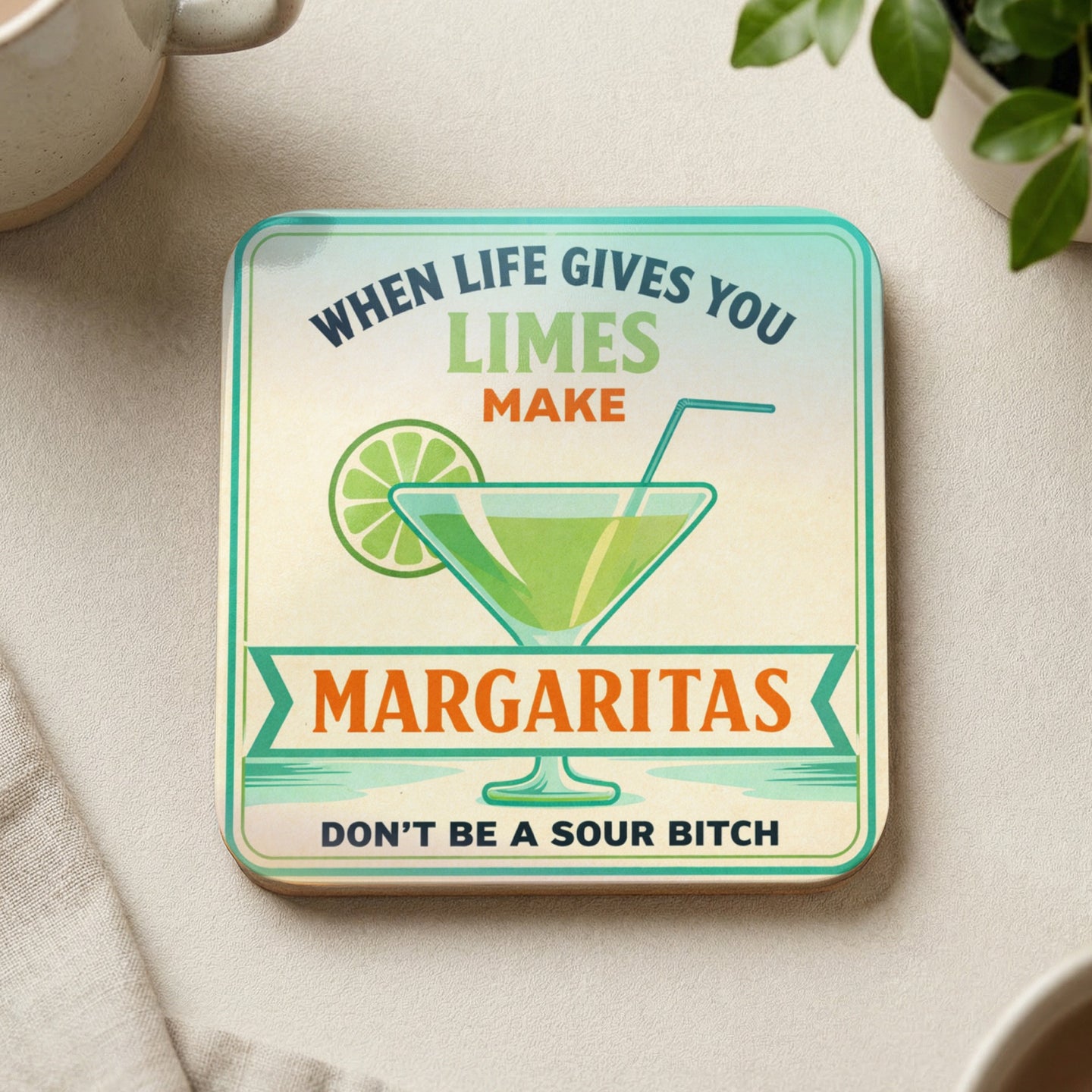 Square coaster with margarita glass, limes, and text "When life gives you limes make margaritas. Don't be a sour bitch."