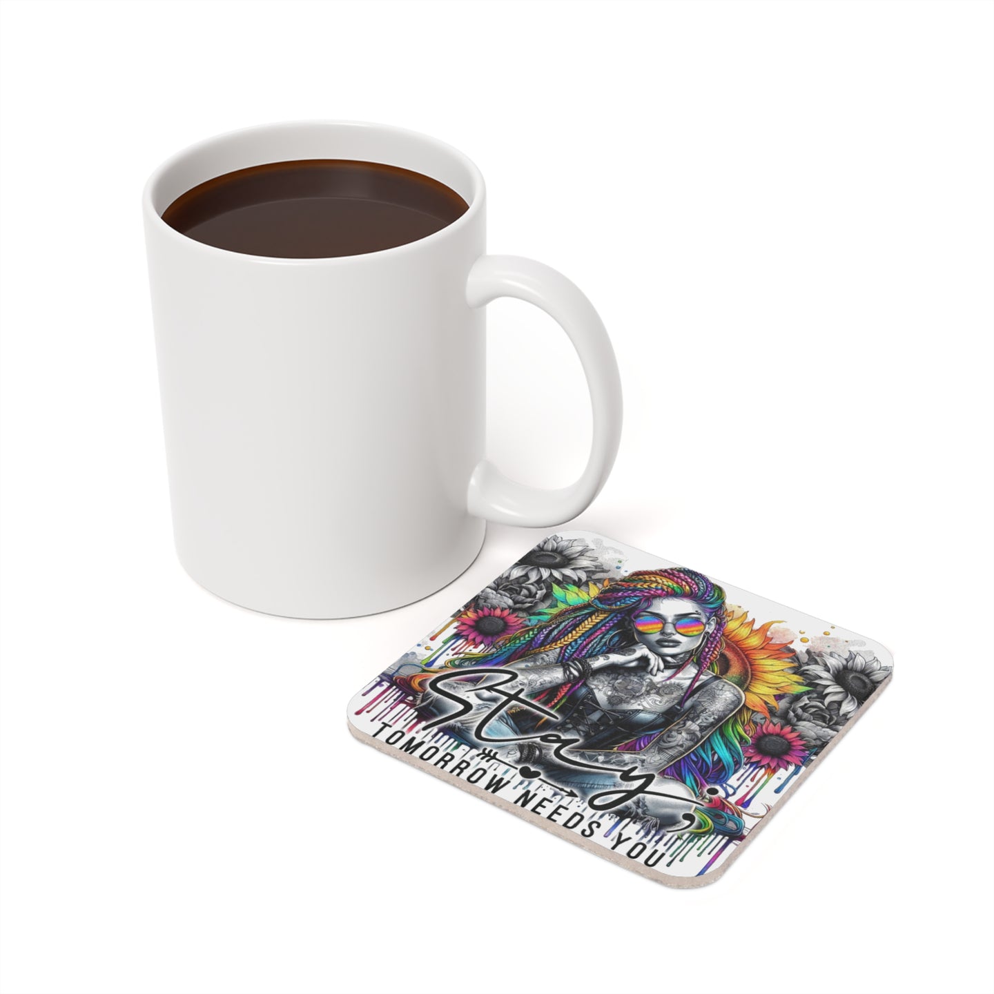 White mug and square coaster with colorful "Stay" tattoo art and flowers.