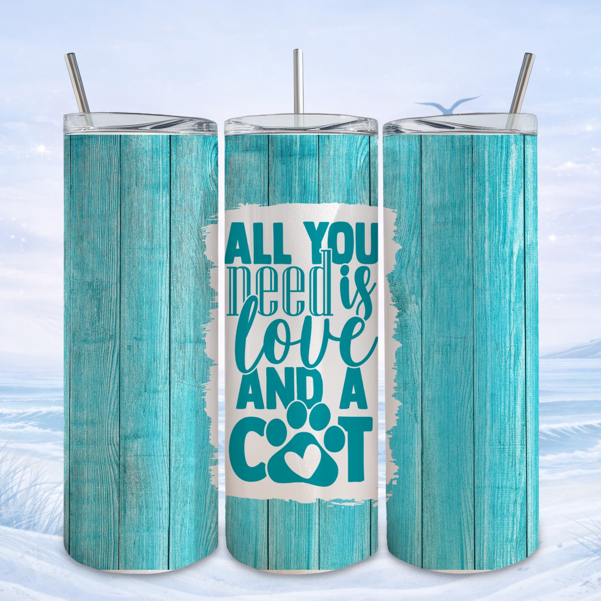 All you need is love and a cat tumbler design with a paw print.