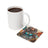 White mug beside a square coaster with a woman tattooed and the text "GIVE POSITIVE THOUGHTS".