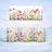 Floral pattern mug set with watercolor wildflowers on a snowy background.