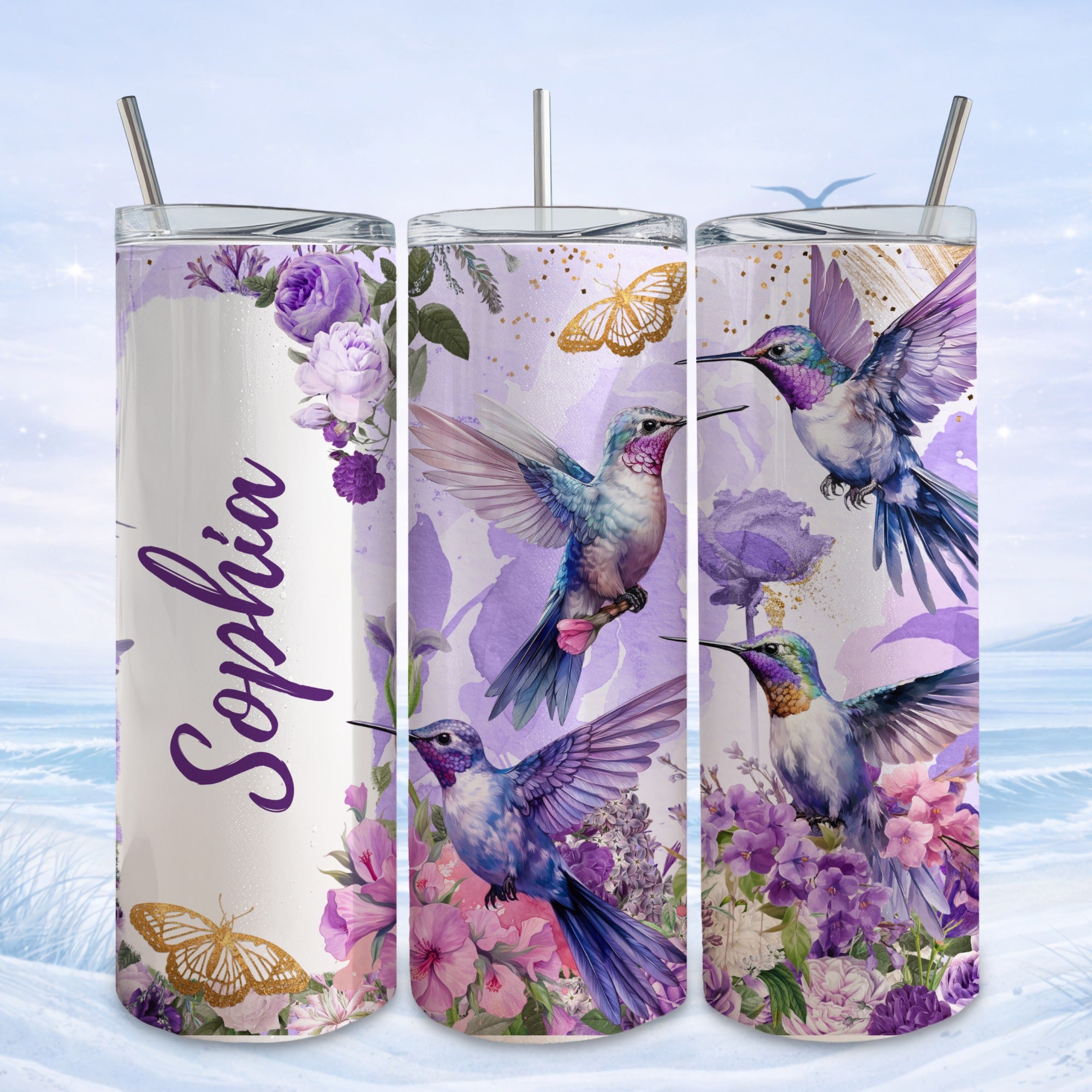 Hummingbirds and butterflies with purple flowers on a floral tumbler design.