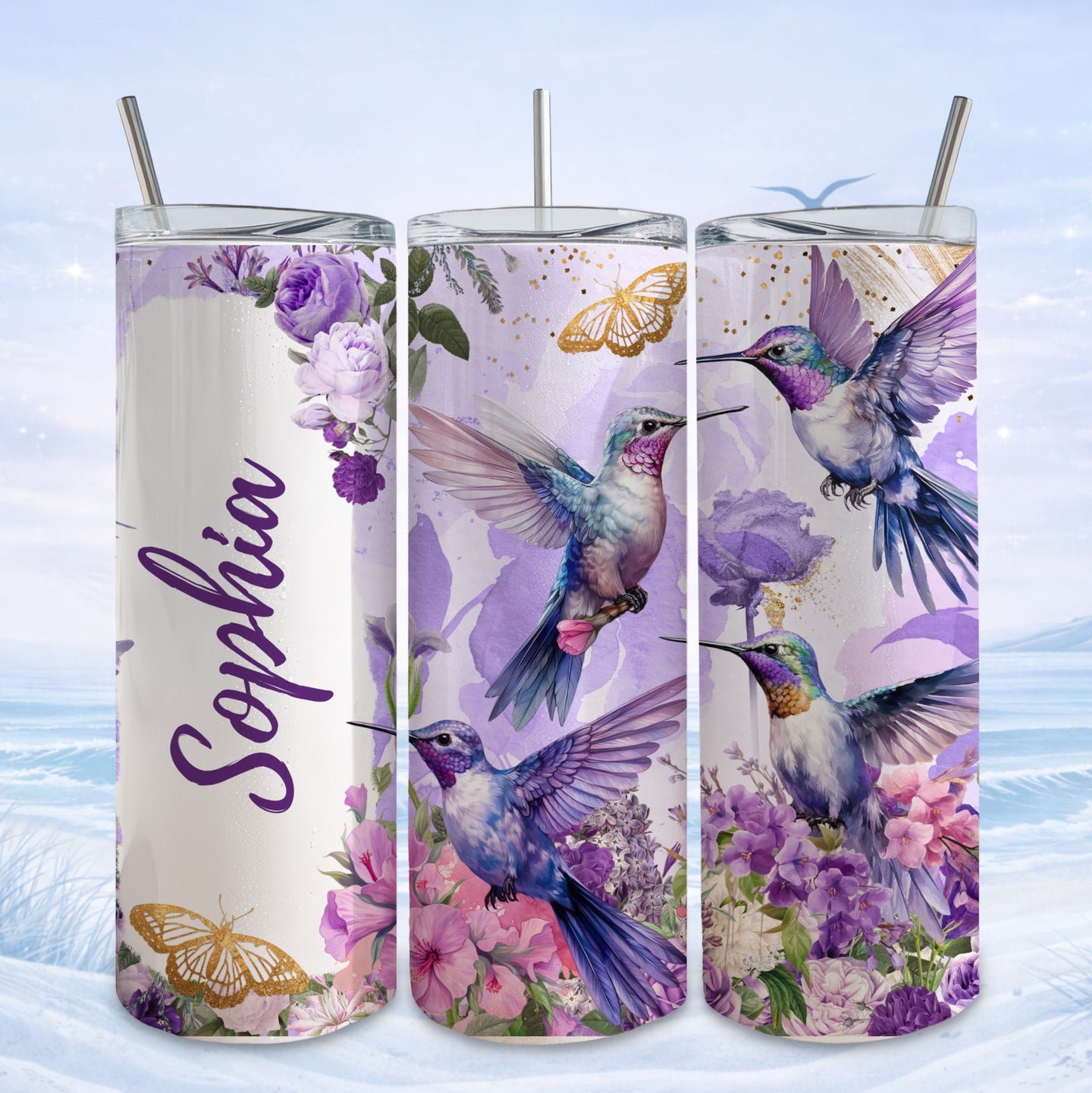 Hummingbirds and butterflies with purple flowers on a floral tumbler design.