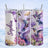Hummingbirds and butterflies with purple flowers on a floral tumbler design.