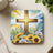 Cross with sunflowers and daisies under bright sunbeams.