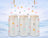 Three frosted glass mugs with colorful paw prints on a winter landscape background.