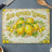 Glass cutting board with "Sun-Ripened Lemons" text and lemons with leaves.