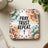 Square coaster with colorful floral border and "Pray. Trust. Repeat." text.