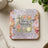 Square coaster with glitter background and "She is Worthy Proverbs 31" text.