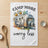 Vintage camper with daisies and text "CAMP MORE WORRY LESS".