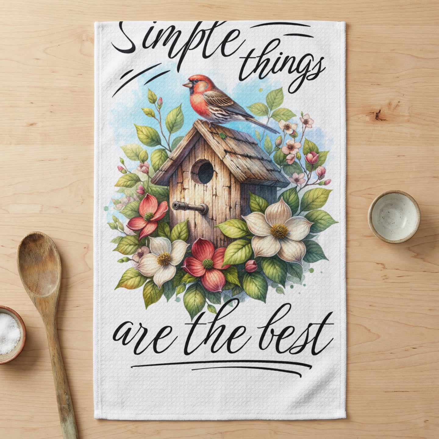 Towel with birdhouse, flowers, bird, and text "Simple things are the best".
