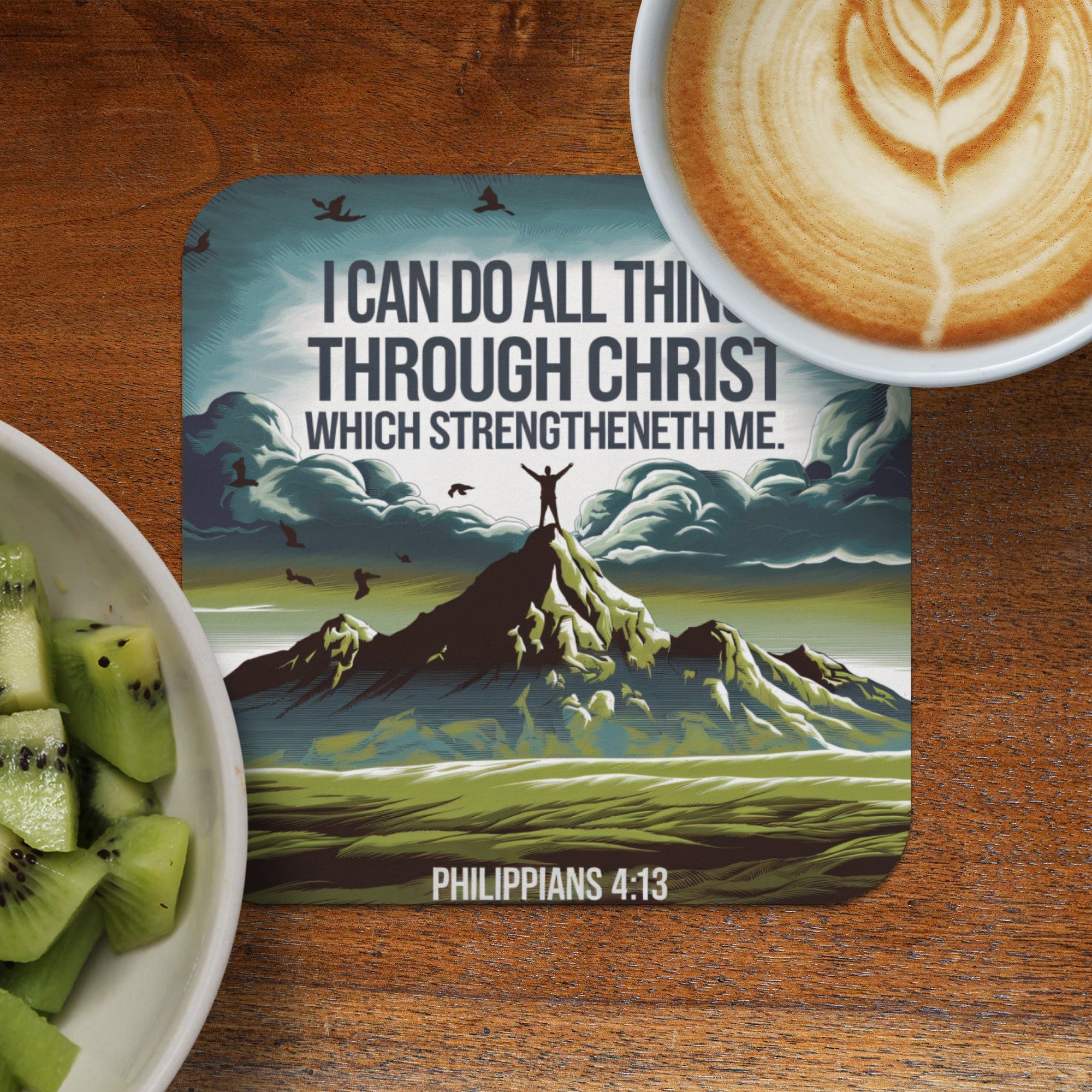 Coaster with Philippians 4:13 quote and person on mountaintop.