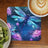 Blue dragonfly on floral background with coffee and kiwi.