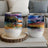 Two insulated tumblers with abstract landscape art in vibrant watercolor style.