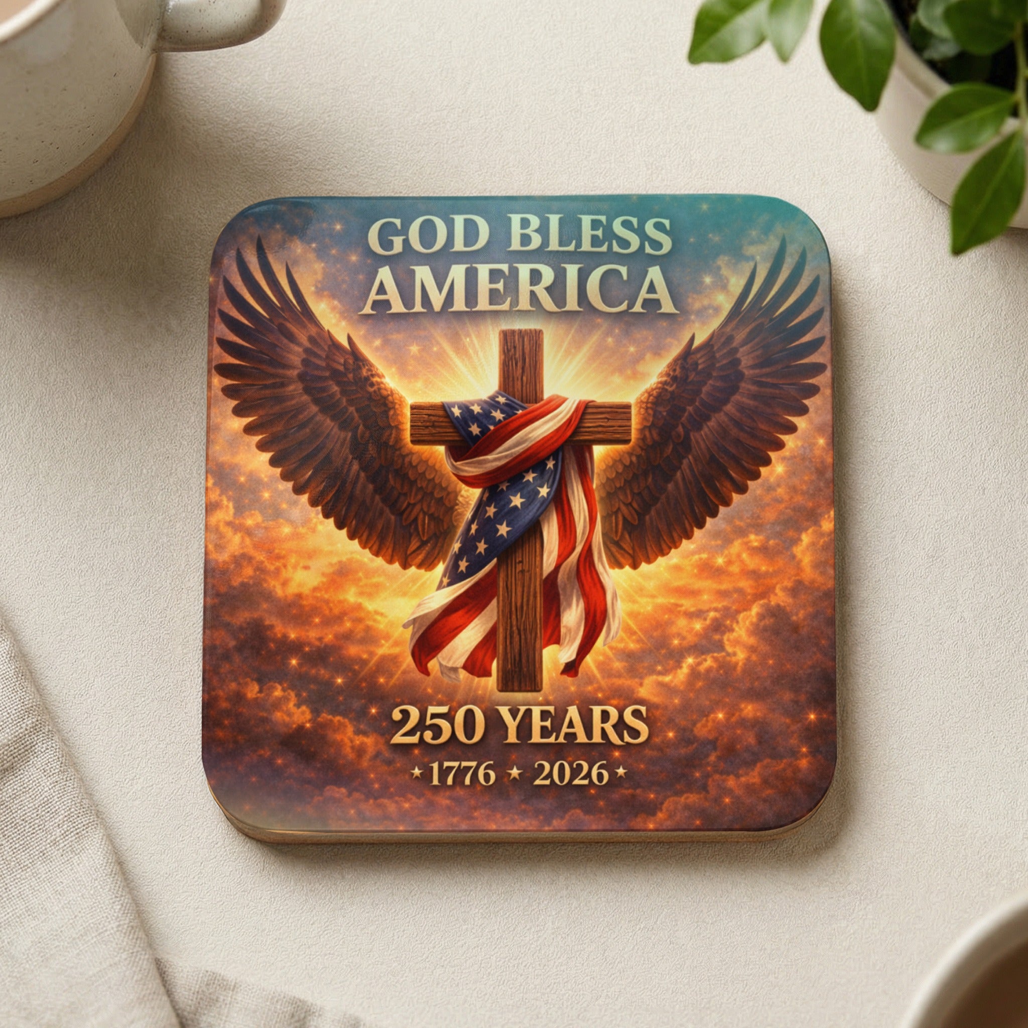American flag draped cross with wings, "God Bless America," and "250 Years 1776-2026".